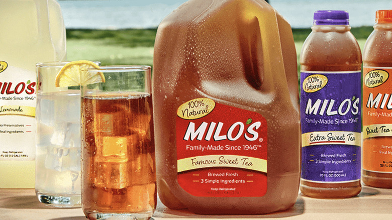 Cartons of Milo's iced tea in the fridge at a grocery store