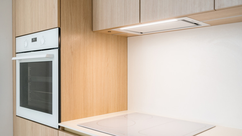 kitchen with integrated range hood