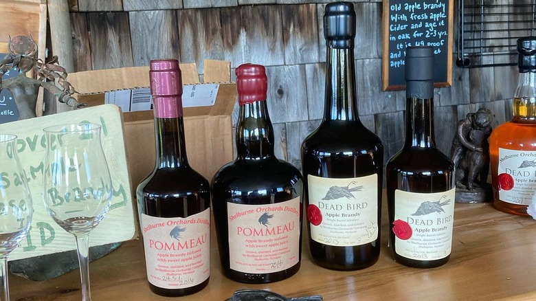 Bottles of Dead Bird Brandy and Pommeau at the tasting room