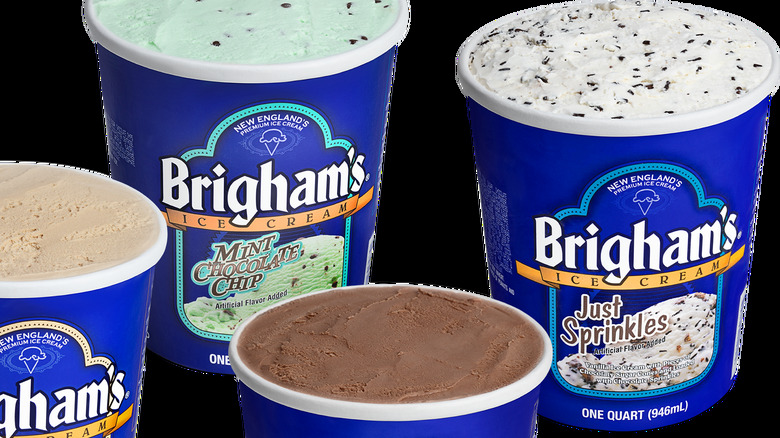 Four tubs of Brigham's ice cream with the lids off