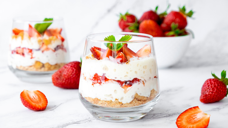 Whipped yogurt cream with strawberries and granola