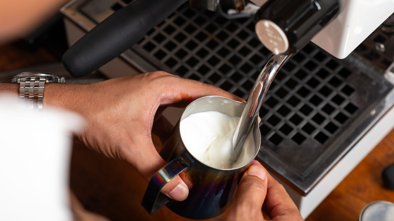 barista steaming milk