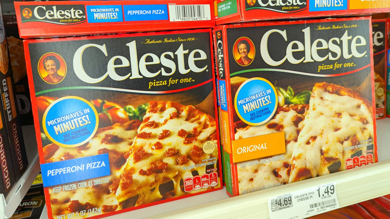 Boxes of Celeste frozen pizza on a store shelf.