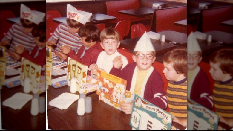 Kids eating Fun Meals at a birthday party at Burger Chef in the 1970s