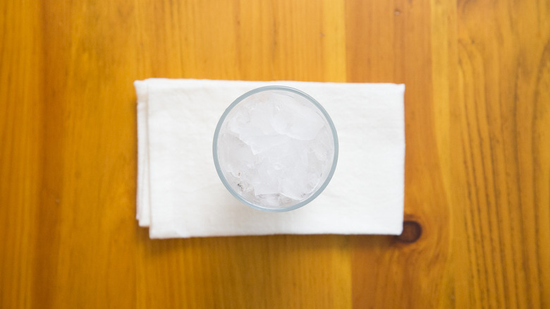 glass of ice on table