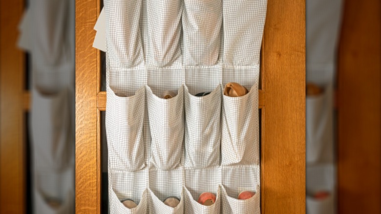 shoe storage rack hanging on door