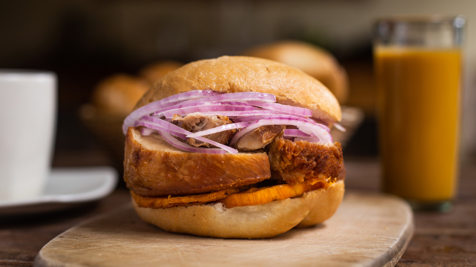 This Peruvian Sandwich Mixes Sweet Potato And Pork Belly - And You Can Eat It For Breakfast - Tasting Table