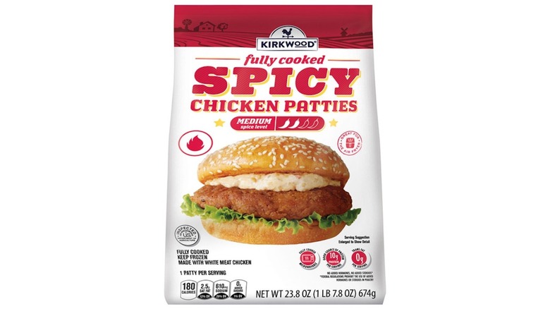 packaging for Aldi spicy chicken patties on white background