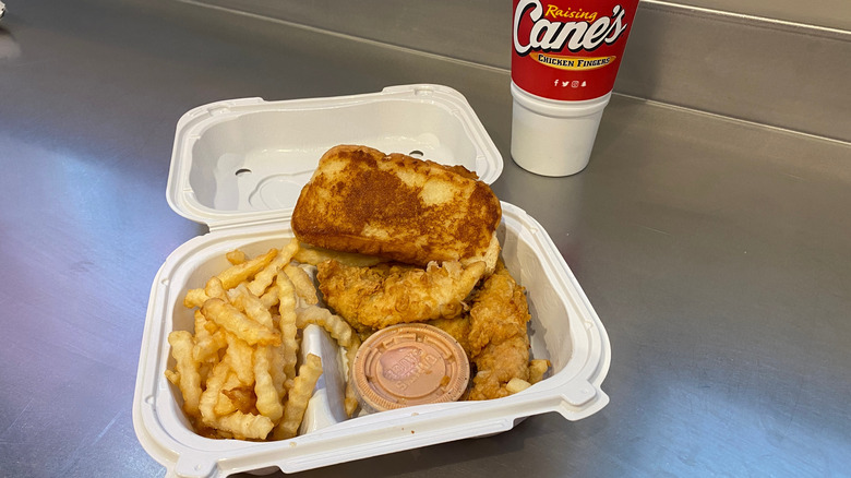 Raising Cane's chicken basket with fries.