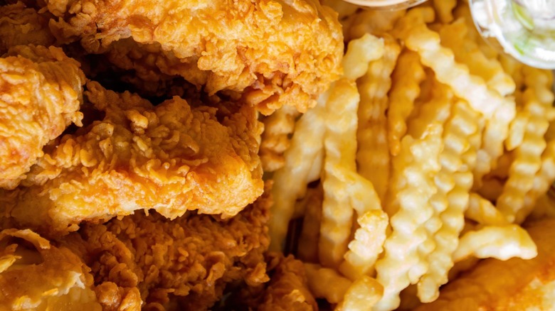 Close-up of Raising Cane's chicken and fries.