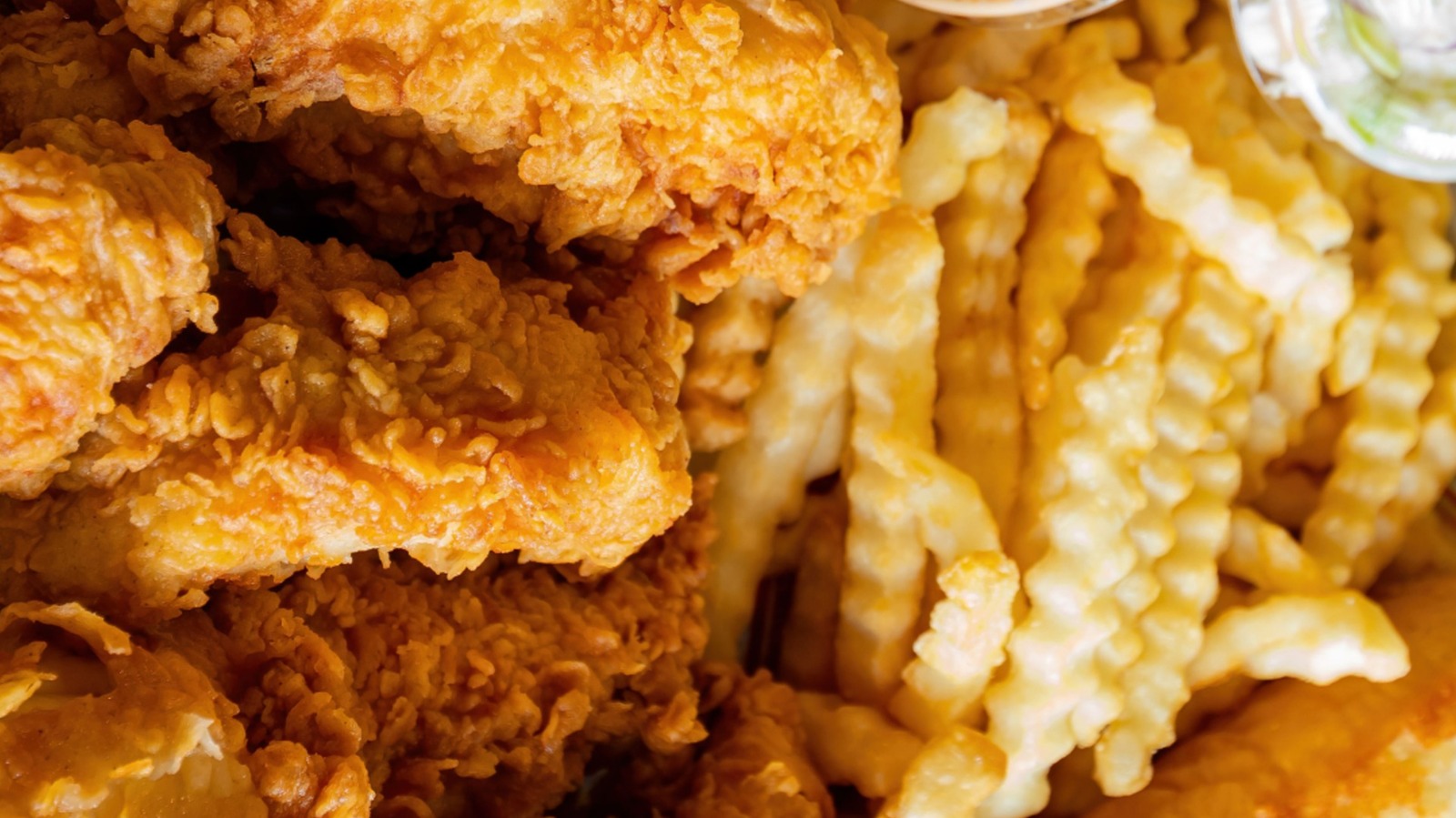 This Popular Chicken Chain Is Guilty Of Soggy Fries, According To Customers