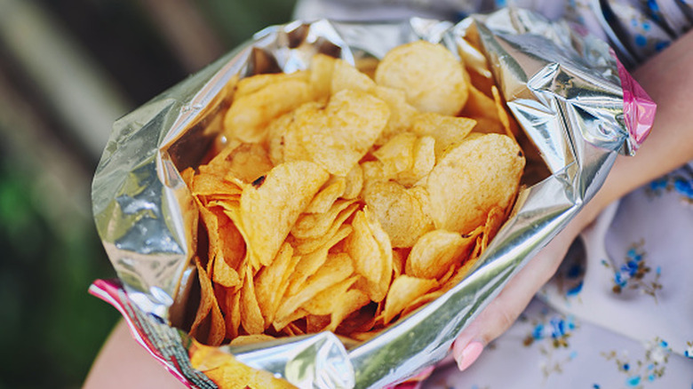 Open bag of potato chips