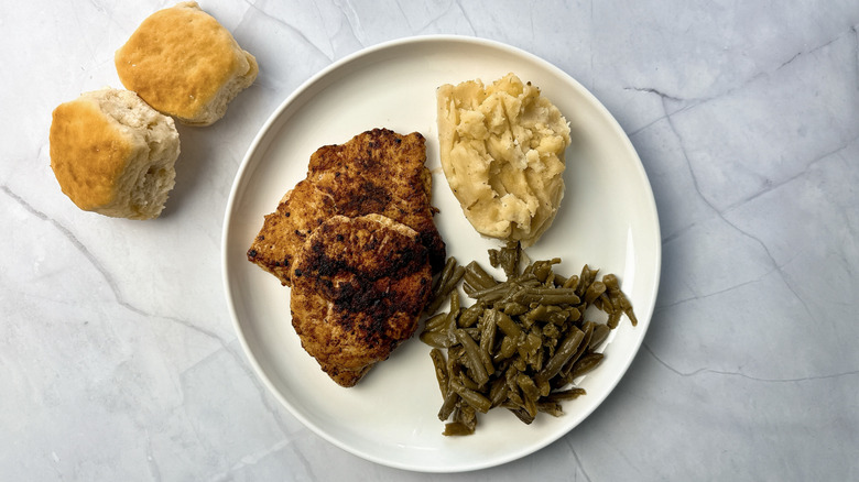 Cracker Barrel Smokehouse Grilled Chicken on plate with sides.