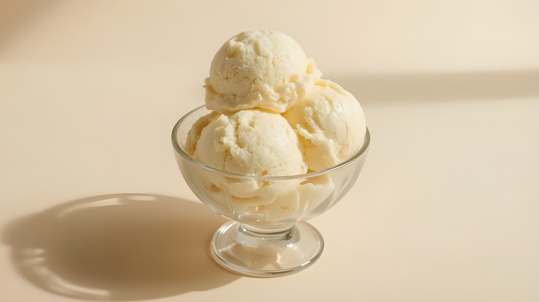 Glass dish of vanilla ice cream