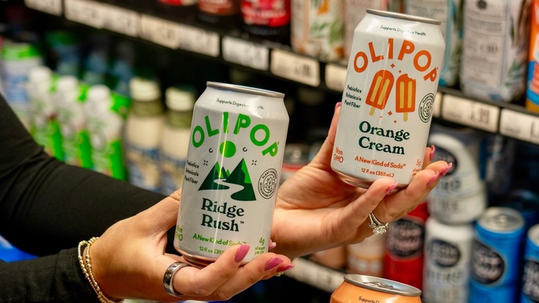 cans of Ridge Rush and Orange Cream Olipop