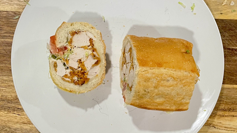 chicken tender sub on a white plate