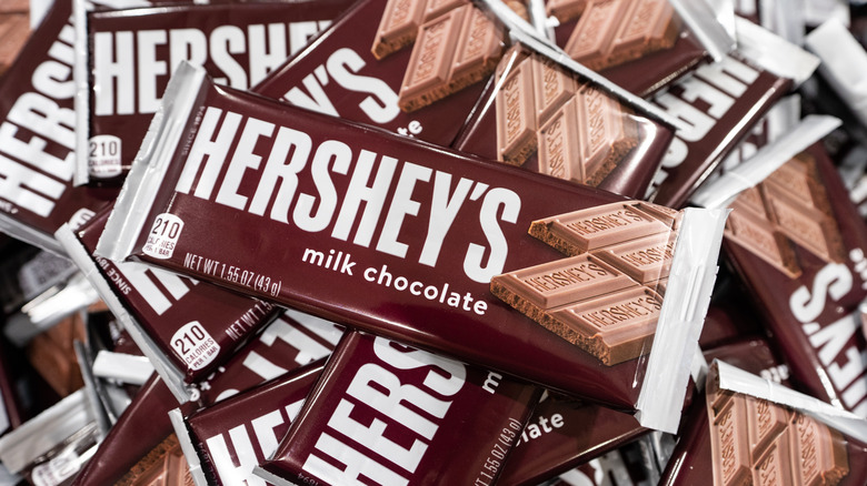 Pile of wrapped Hershey's original milk chocolate bars