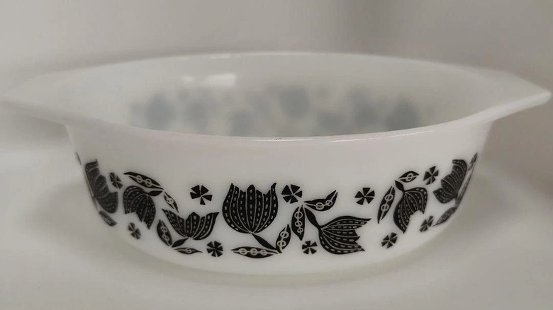 Black Tulip Pyrex casserole dish on white background