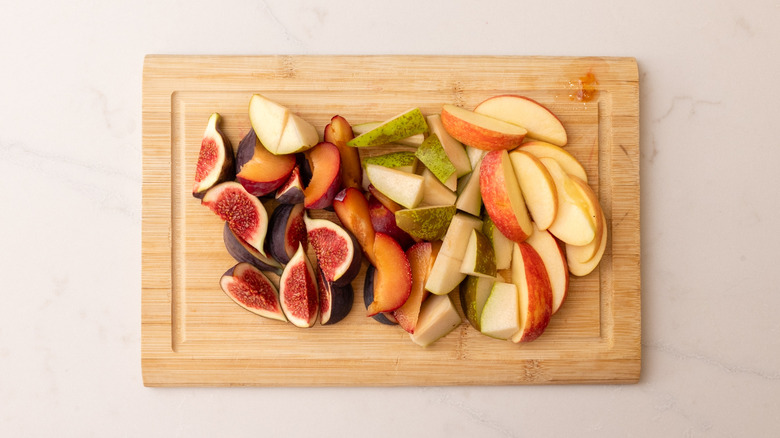 sliced fruit on chopping board