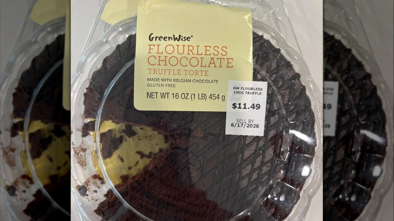 Packaged Flourless Chocolate Truffle Torte with one piece missing