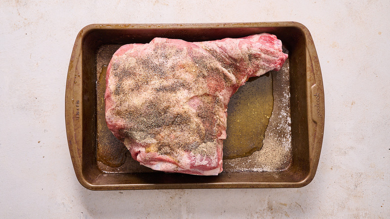 lamb coated with oil and seasoning