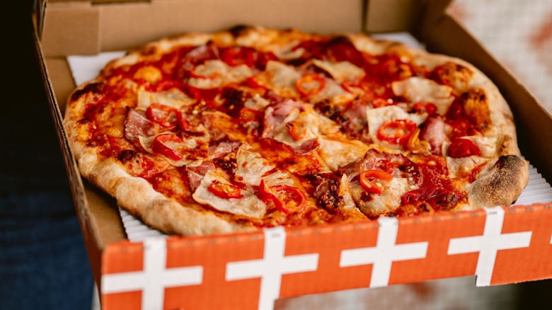 A Flour + Water pizza in a box