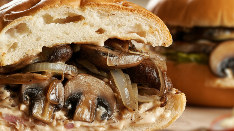 closeup of a mushroom and caramelized onion sandwich