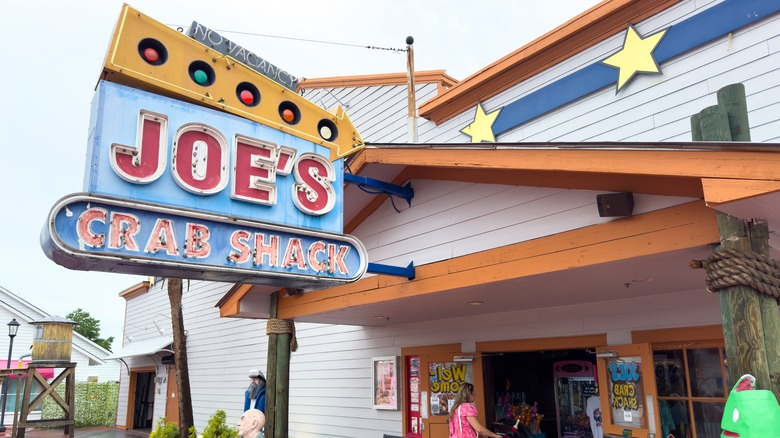 Exterior of Joe's Crab Shack with people walking through the front door