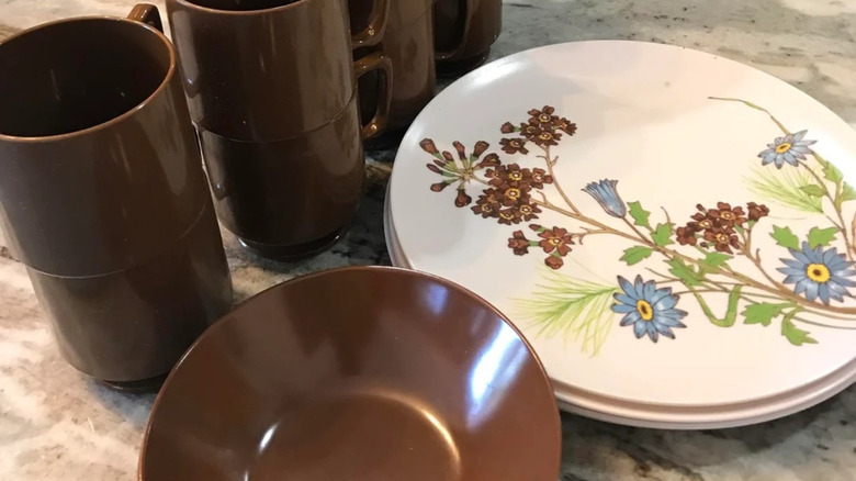 Vintage brown and white Melmac dishes on kitchen counter