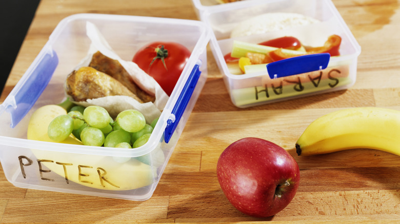 Names written on sandwich boxes in pen