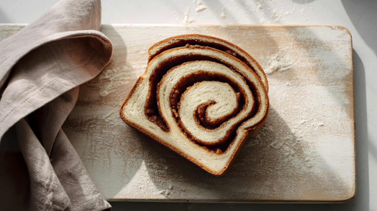 This Simple Rolling Technique Is Key To Eliminating Gaps In Cinnamon Swirl Bread - Tasting Table