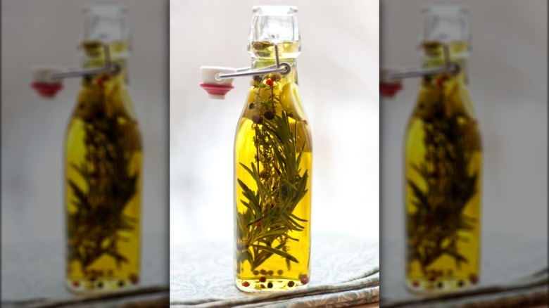 Olive oil with herbs and peppercorns