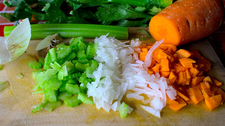 a mirepoix chopped on a cutting board