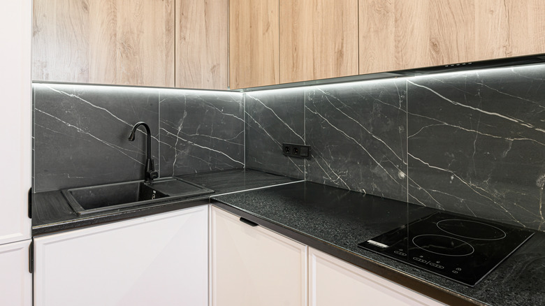 kitchen corner with slab backsplash