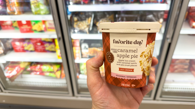 Customer holding ice cream pint