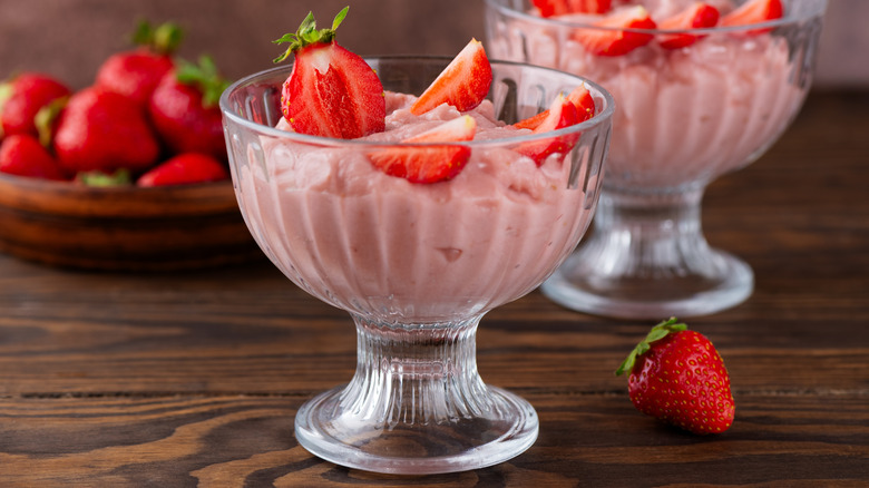 Strawberry whipped dessert in glass bowls