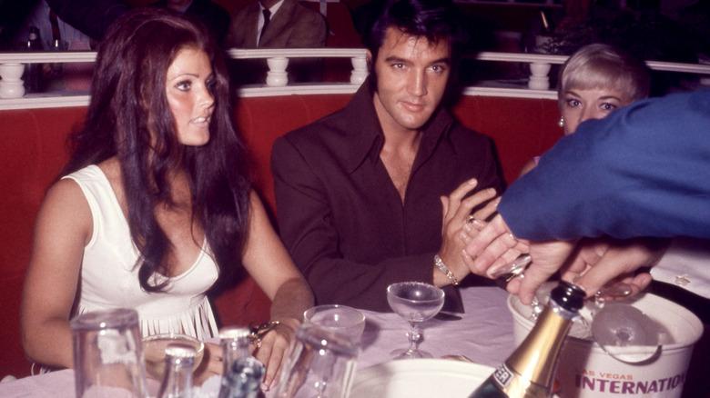 Elvis and Priscilla Presley dining at the International Hotel in Las Vegas