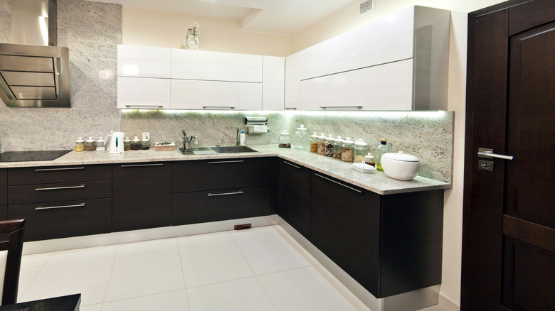 Wide, black kitchen drawers in modern kitchen