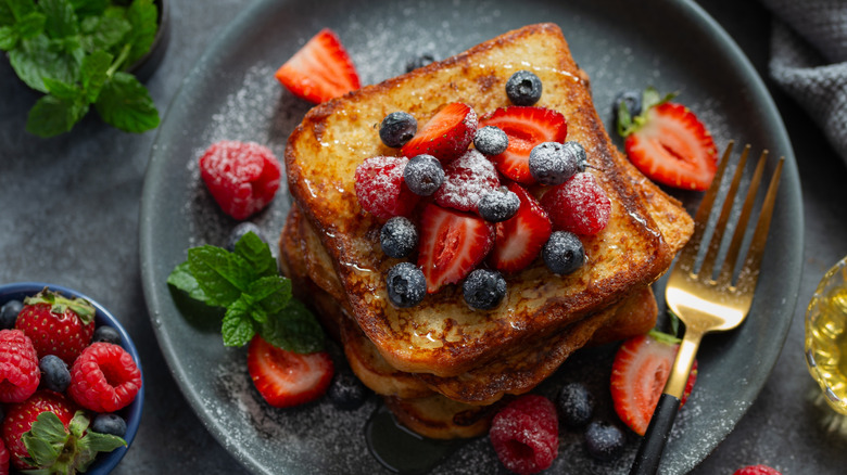 Overhead view of French toast and fruit on a plate