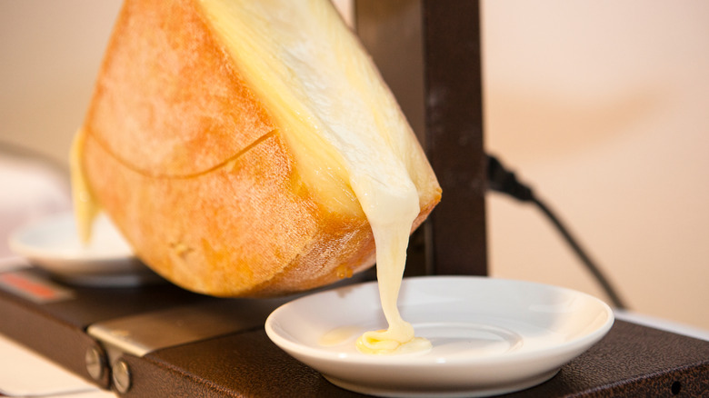 hot Raclette cheese melting