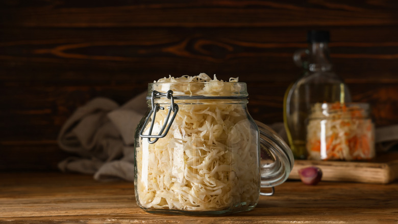 A glass jar of sauerkraut.