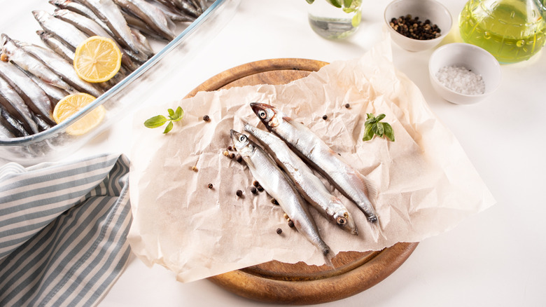 Smelt fish on parchment paper
