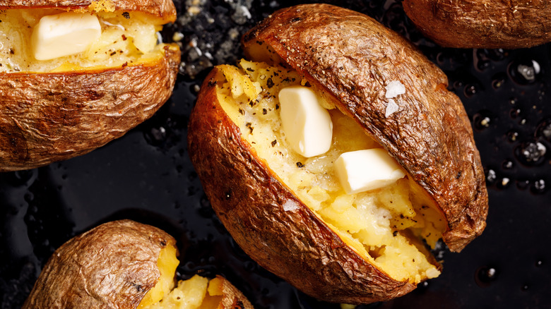 baked potatoes with butter