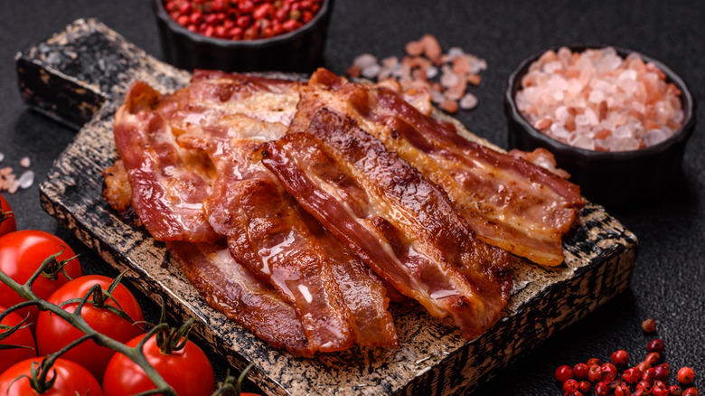 Cooked bacon on a chopping board