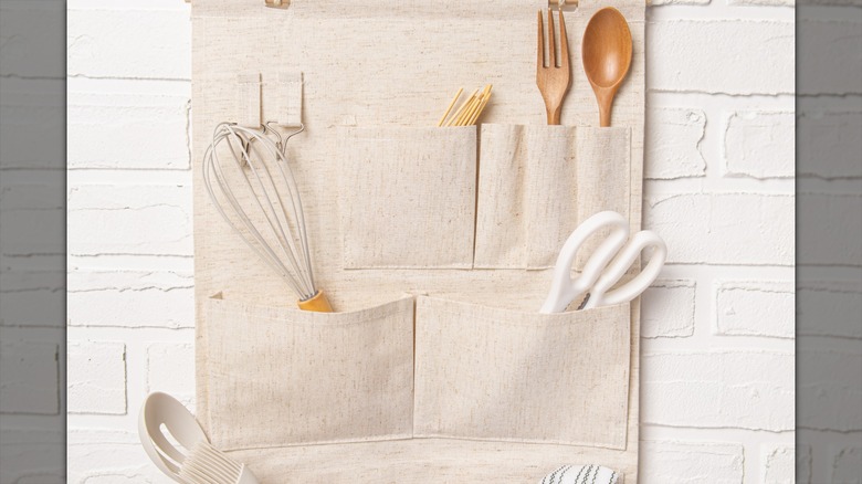 Kitchen tools in hanging storage pockets