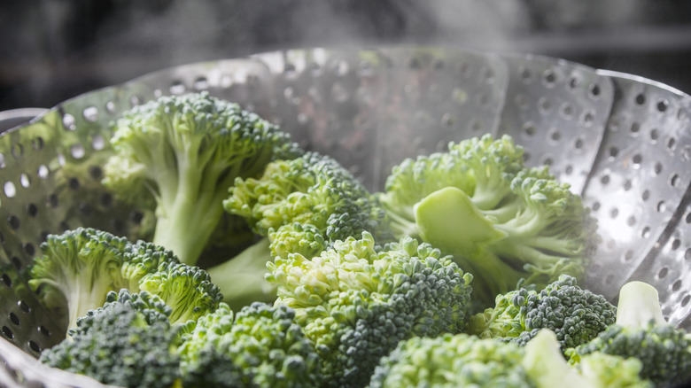 steamer basket with broccoli florets