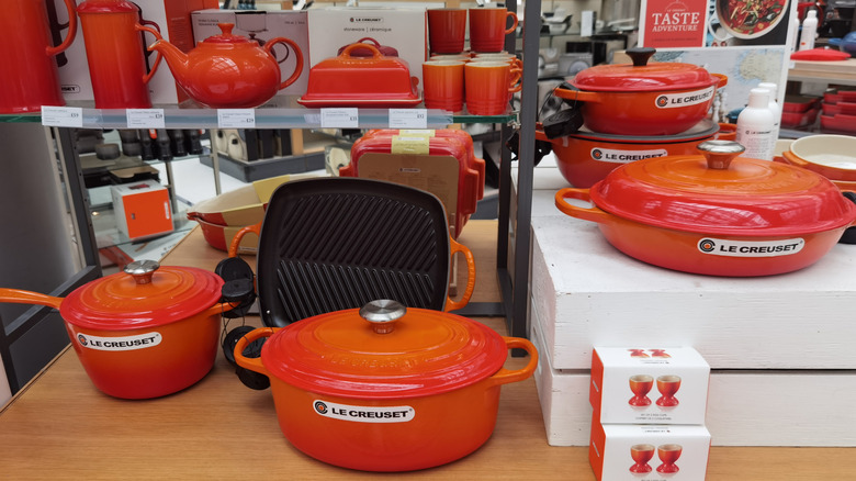 selection of orange Le Creuset cookware