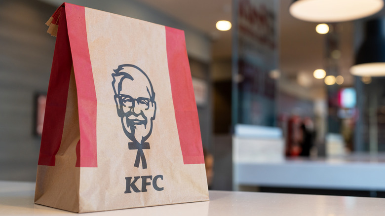 KFC bag on table at restaurant