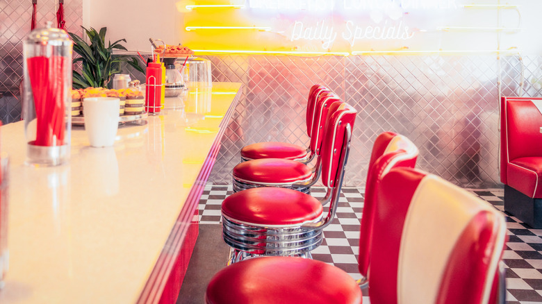 Vinyl dining chairs from 1950s