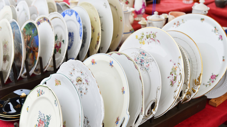 Vintage dishware on display at flea market